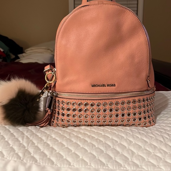 Michael Kors Handbags - Michael Kors Rhea Medium Silver-Ringed Backpack with Fur Pompom in Coral…
